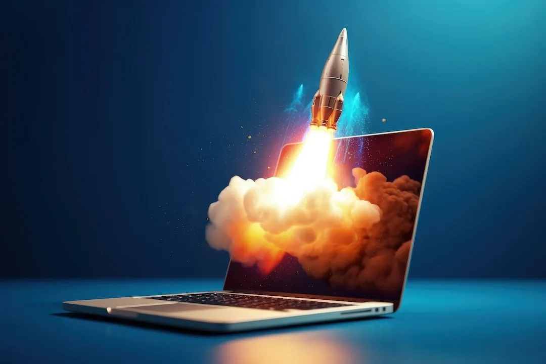 A Moonshot Rocket exploding out of a laptop screen heading for space depicting emerging technologies taking off.